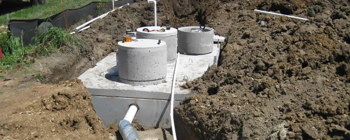 Septic system repair and installation site with tank access ports in Palm Springs, CA
